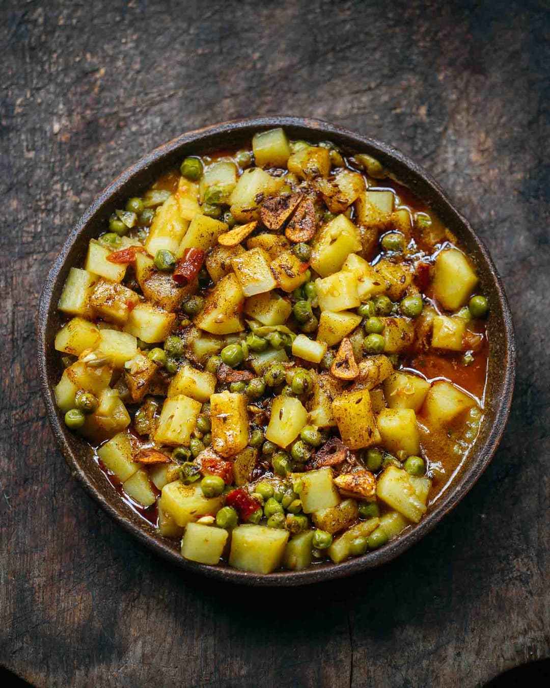 Aloo matar with brown butter and garlic tadka