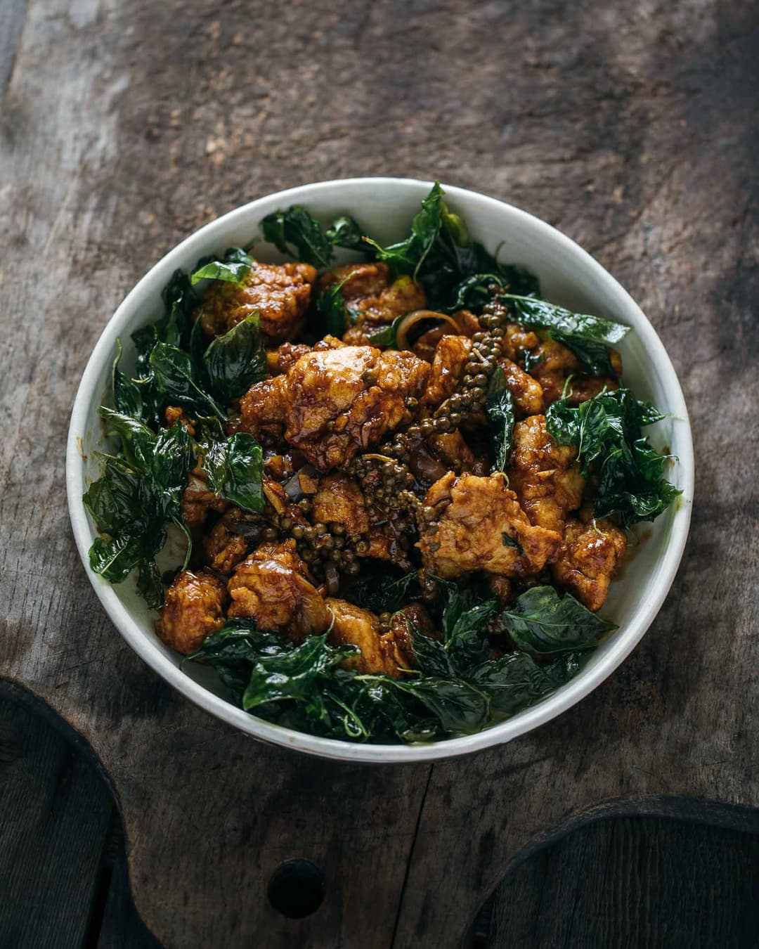 Green peppercorn chicken with crispy basil